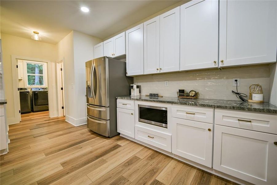 Furnished interior view inside a new home in , Monticello (Image 17).