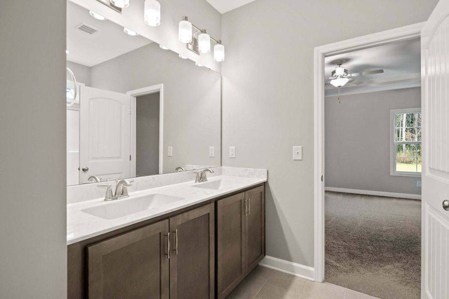 Representative furnished interior of a home built from the Garland by Caviness & Cates Communities in Bartlett Manor, Youngsville (Image 227). Representative furnished interior of a home built from the Garland by Caviness & Cates Communities in Bartlett Manor, Youngsville (Image 227).
