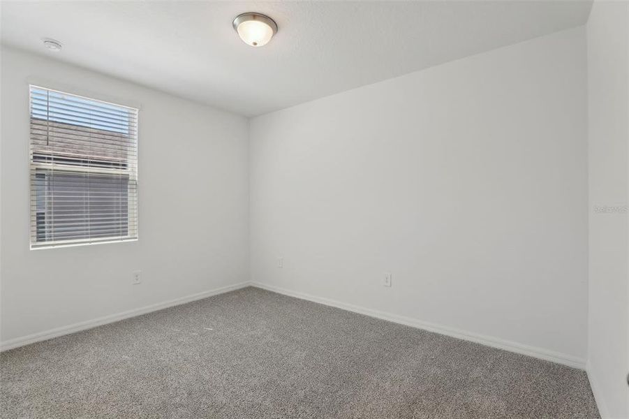 Spacious, unfurnished interior of a new home in Lawson Dunes - Signature Series, Haines City (Image 31).