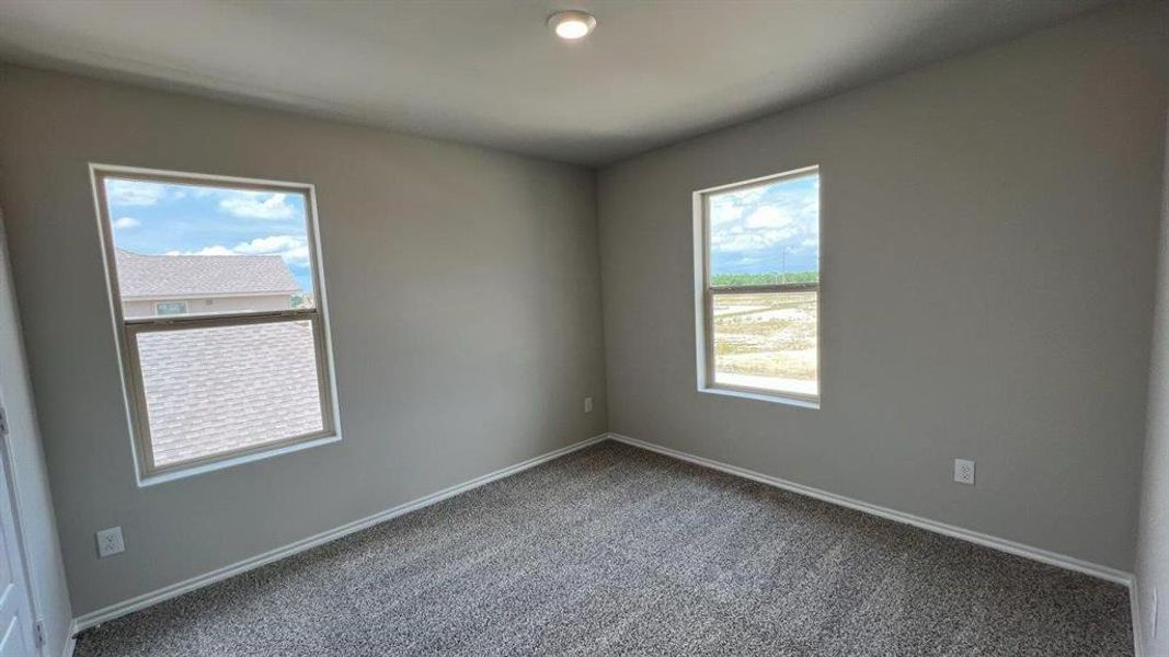 Spacious, unfurnished interior of a new home in Monarch at the Meadows, Ponder (Image 9).