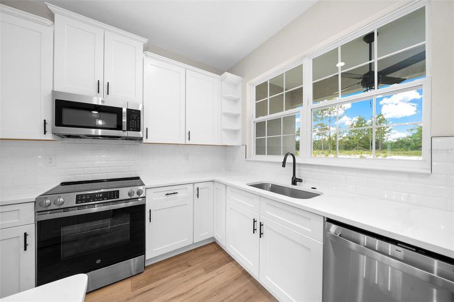 Furnished interior view inside a new home in , Dunnellon (Image 11).