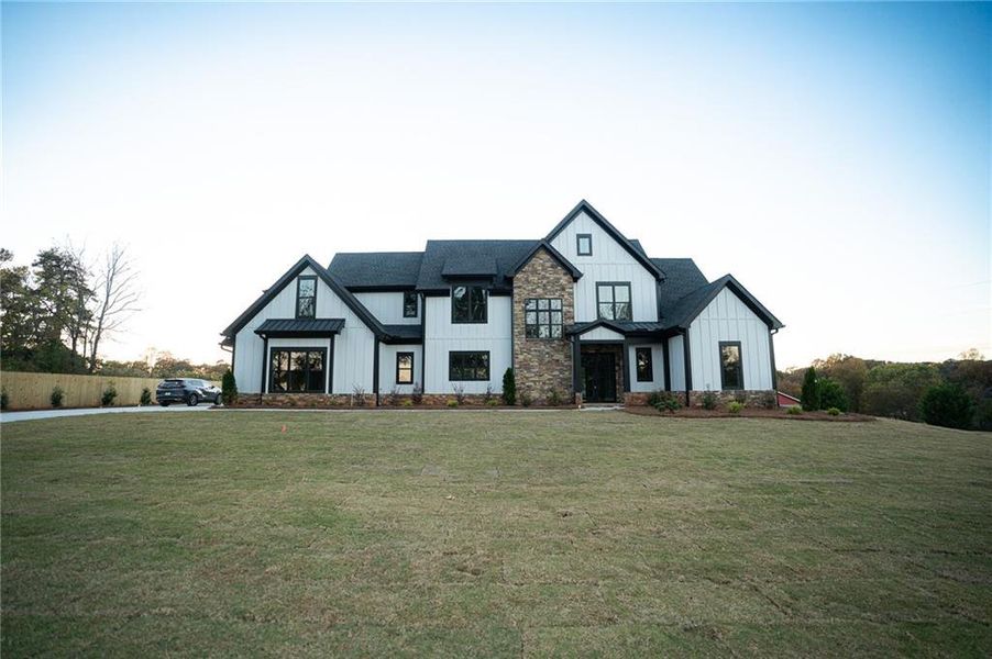 Front exterior of a new home in , Cumming, GA, highlighting curb appeal (Image 28).
