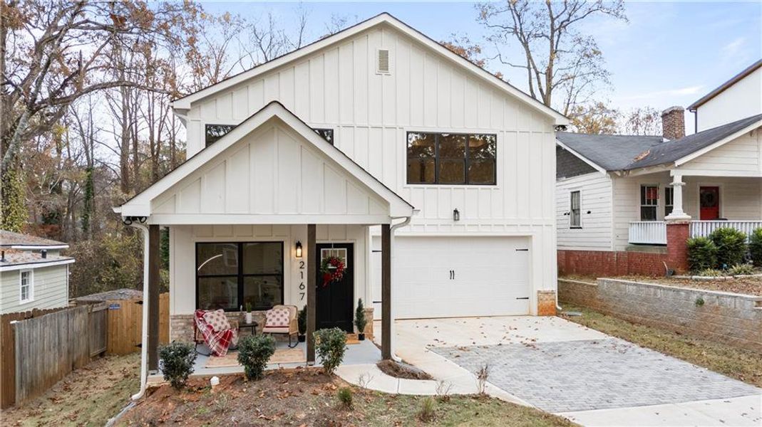 Front exterior of a new home in , Atlanta, GA, highlighting curb appeal (Image 1).