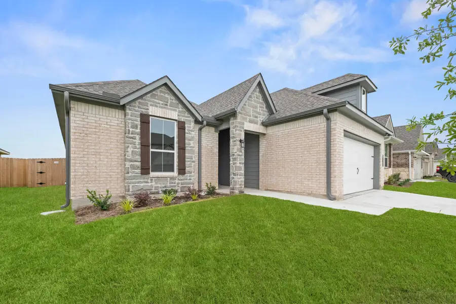 Front exterior of a new home in Hartrick Ranch, Temple, TX, highlighting curb appeal (Image 1). Front exterior of a new home in Hartrick Ranch, Temple, TX, highlighting curb appeal (Image 1).