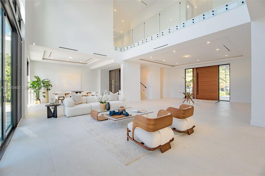 Formal living room with a massive lobby and grand entry Formal living room with a massive lobby and grand entry