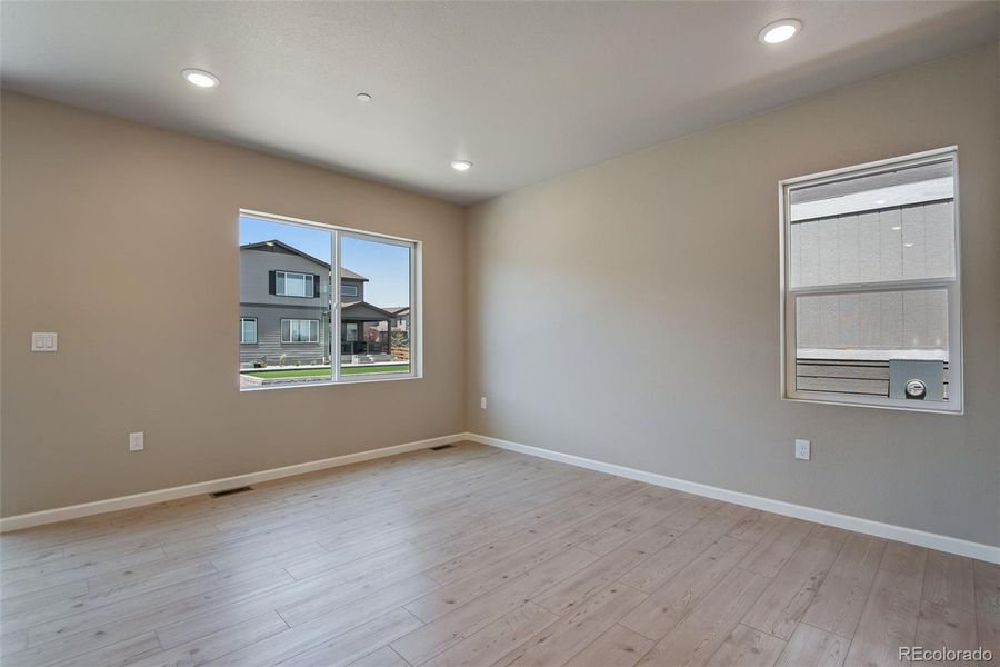 Spacious, unfurnished interior of a new home in Reunion Ridge, Commerce City (Image 45).