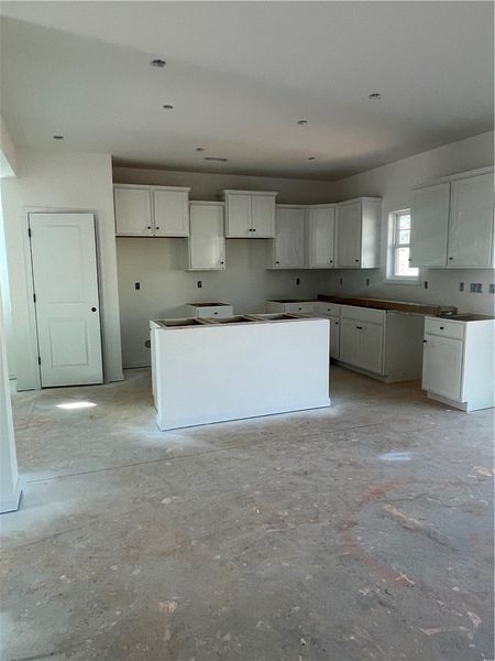 This spacious kitchen offers ample cabinetry and a This spacious kitchen offers ample cabinetry and a