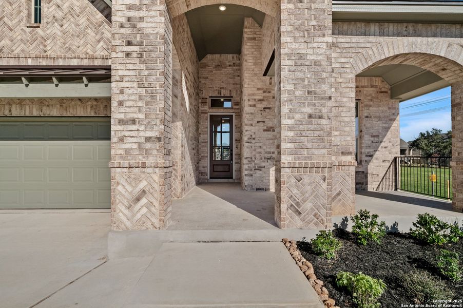 Exterior details and patio area of a home in Ventana, Bulverde (Image 17).