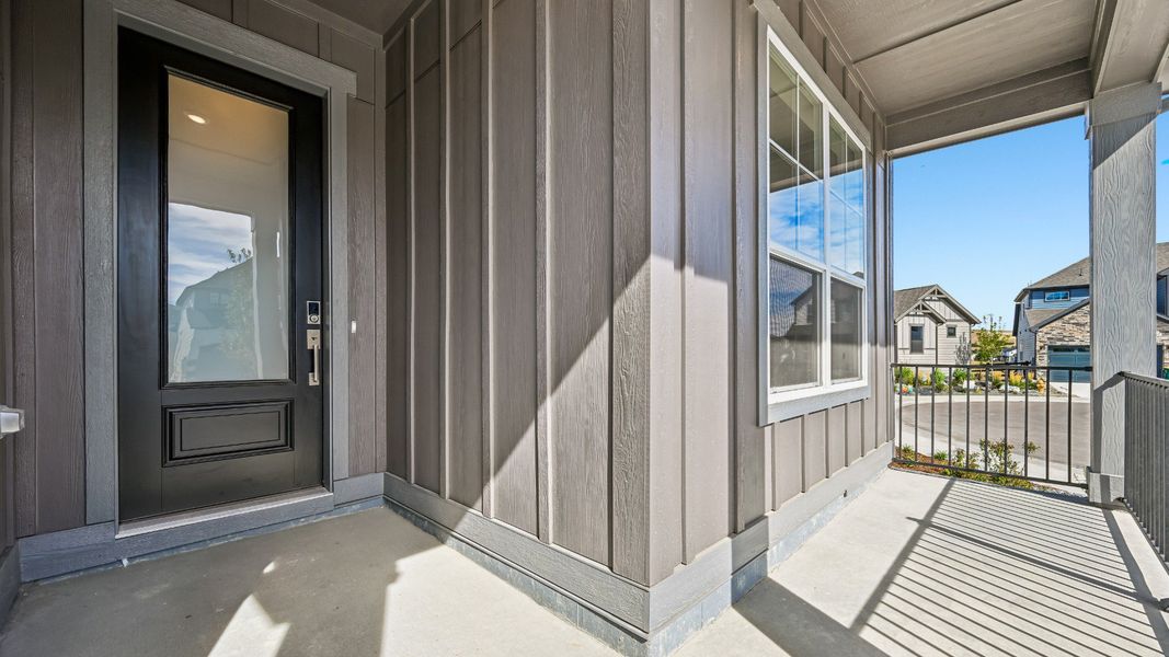 Covered porch creates the perfect space to relax outdoors
