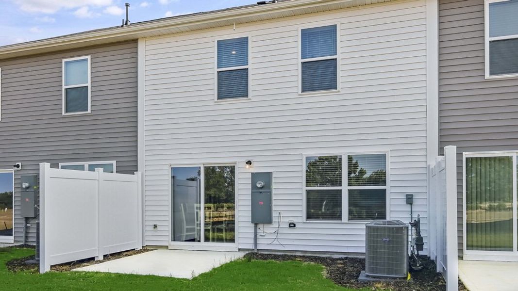 Representative exterior photo of a completed home built from the ALTAMONT by D.R. Horton in The Townes at Honeycutt Oaks, Angier, NC (Image 27).