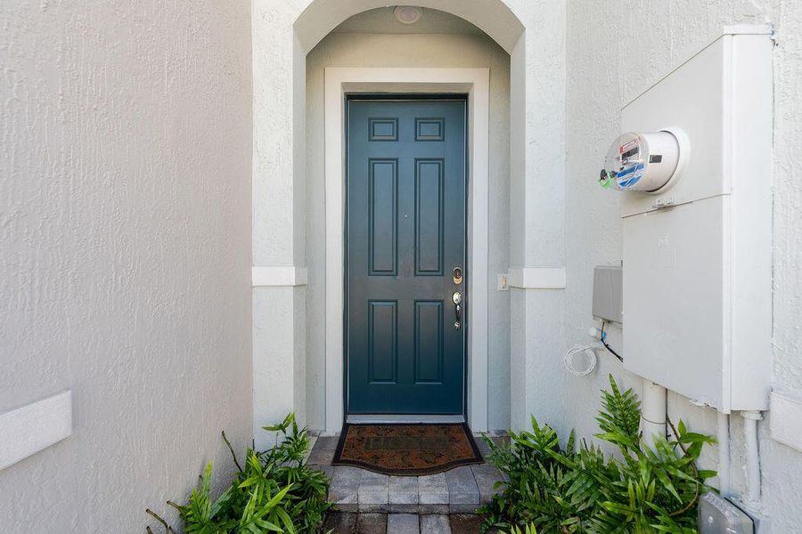 Exterior details and patio area of a home in , West Palm Beach (Image 1).
