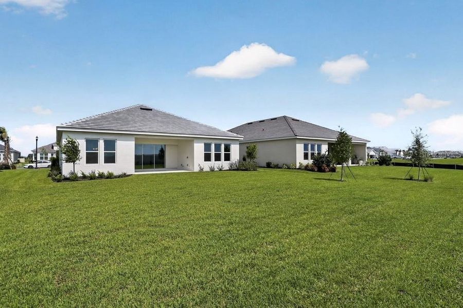 Exterior details and patio area of a home in Coasterra Community Group Page, Palmetto (Image 4).