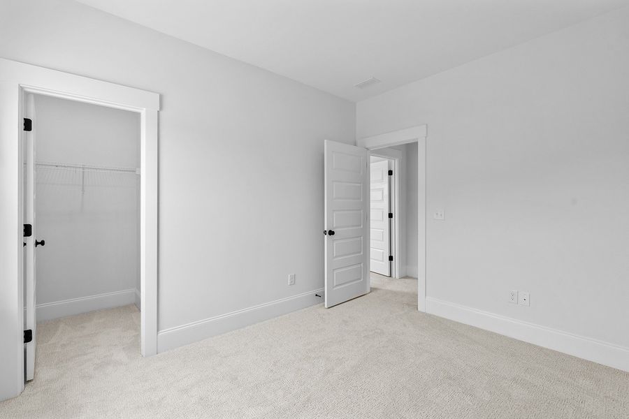 Spacious, unfurnished interior of a new home in Lilah Grove, Summerfield (Image 39).