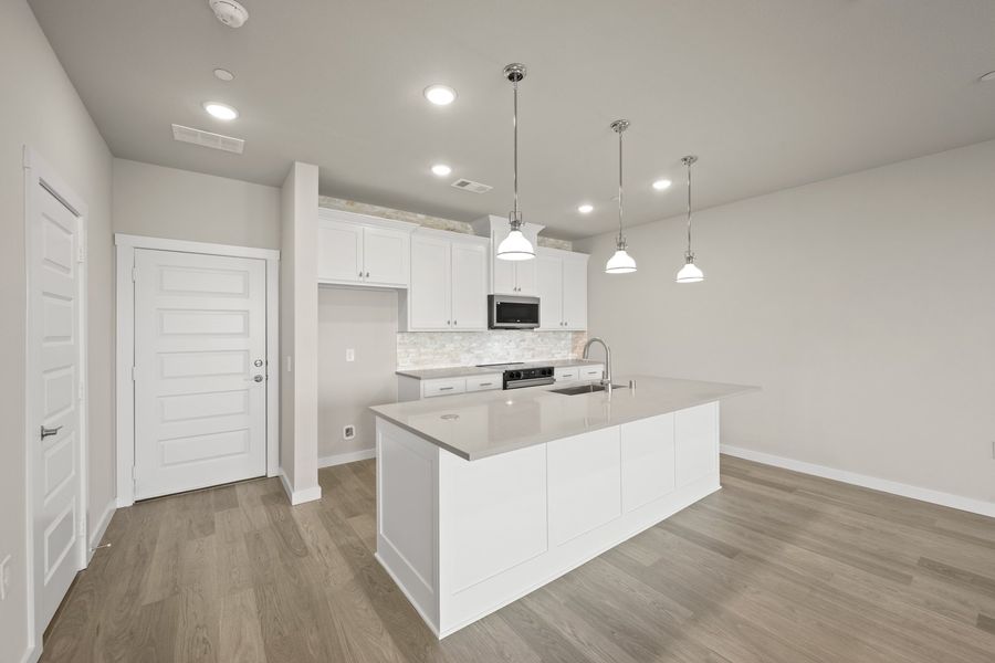 Furnished interior view inside a new home in Wildridge, Oak Point (Image 6).