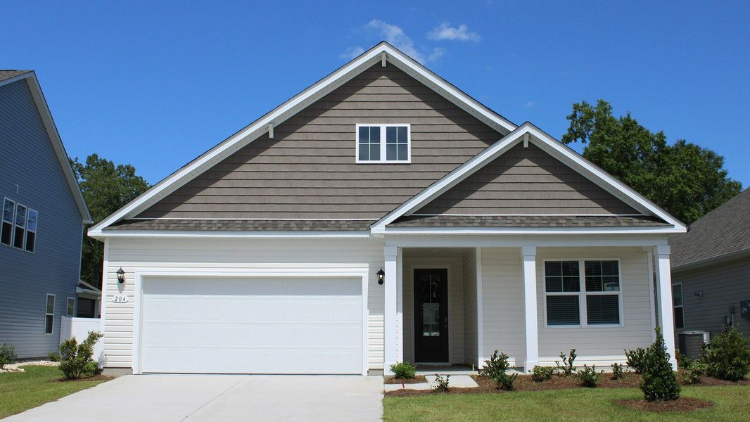 Representative exterior photo of a completed home built from the Litchfield by D.R. Horton in The Bluffs at Mill Creek, Florence, SC (Image 21).