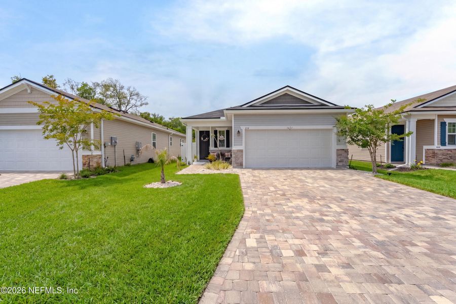 Front exterior of a new home in Verano Creek, St. Augustine, FL, highlighting curb appeal (Image 20).