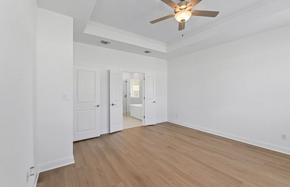 Spacious, unfurnished interior of a new home in Bluffview Reserve, Leander (Image 67).
