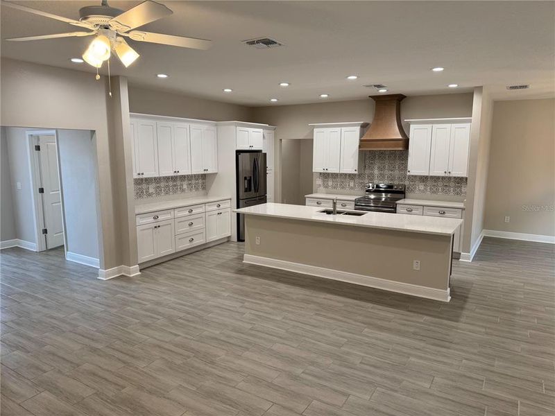 Furnished interior view inside a new home in , Dade City (Image 10).