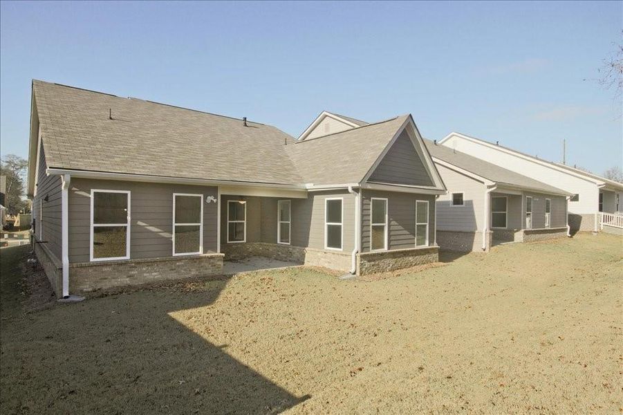 Exterior details and patio area of a home in Cooper's Walk, Loganville (Image 18).