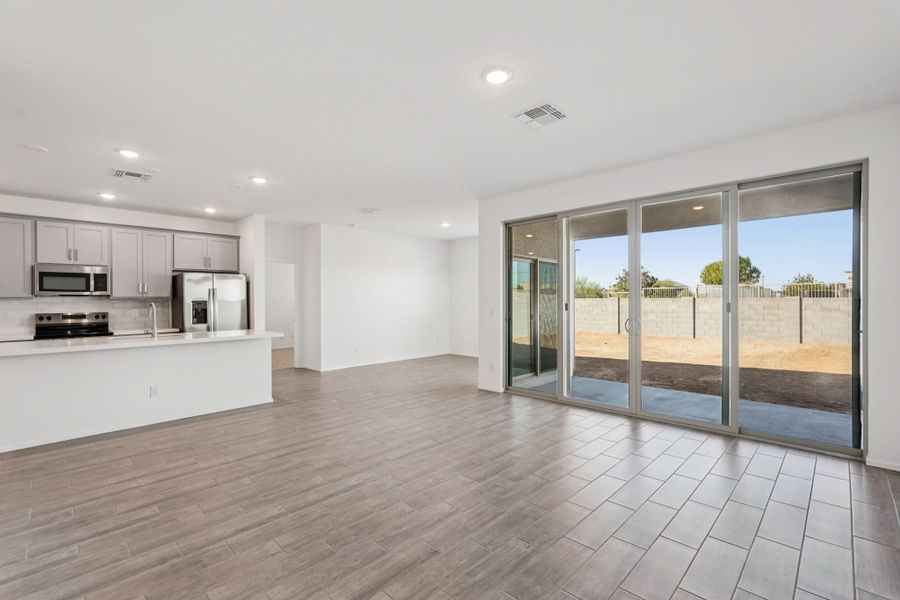 Great room, kitchen and dining. Finishes and options may vary by community Great room, kitchen and dining. Finishes and options may vary by community