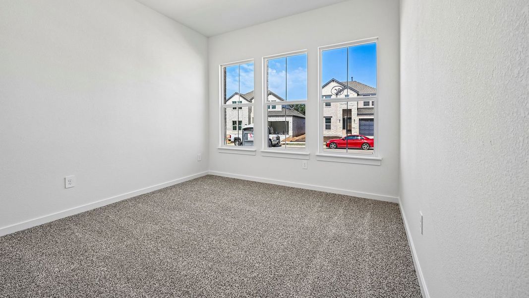 Spacious, unfurnished interior of a new home in The Enclave at Bar W Ranch, Leander (Image 31).