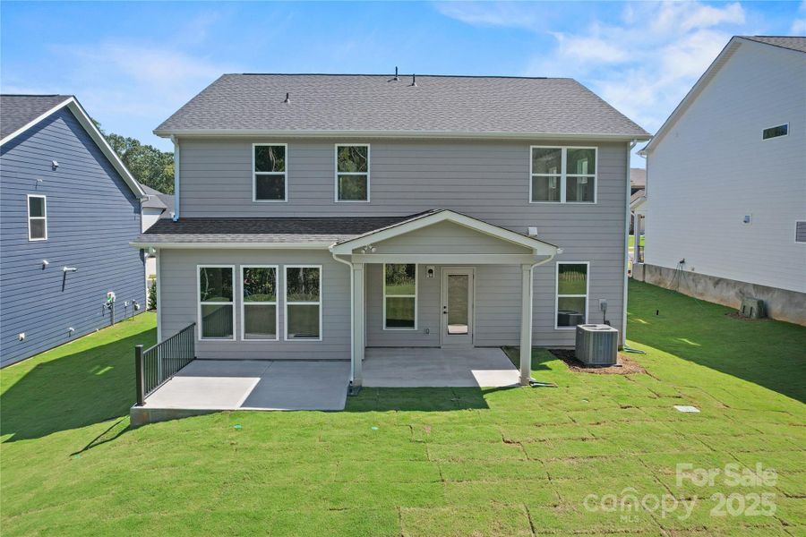 Exterior details and patio area of a home in Forest Creek, Waxhaw (Image 23).