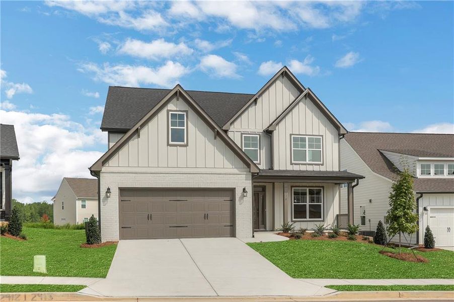 Front exterior of a new home in Twin Lakes, Hoschton, GA, highlighting curb appeal (Image 29).