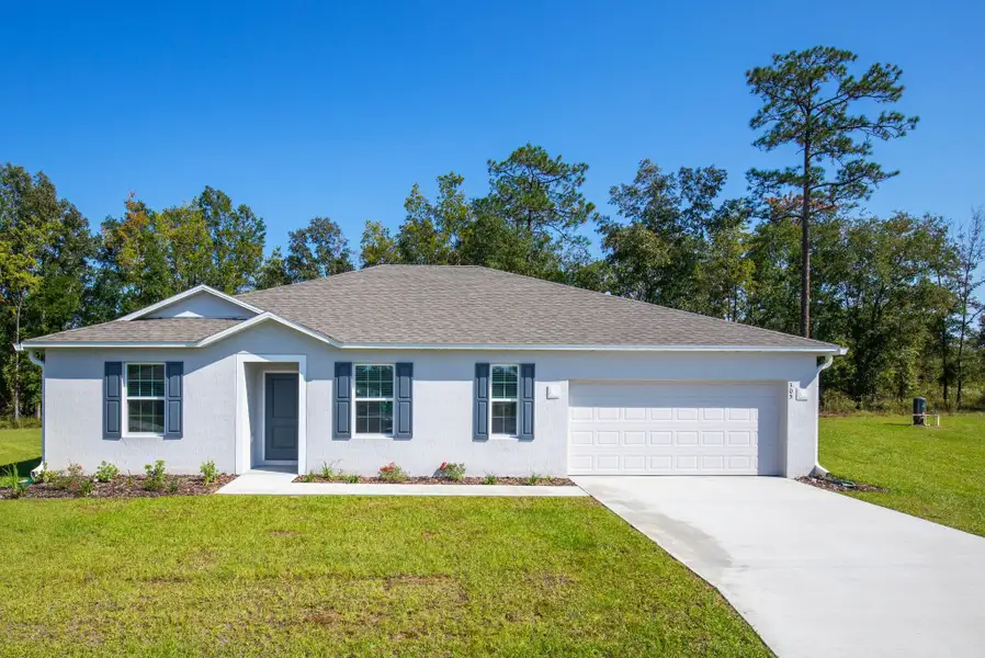 Representative exterior photo of a completed home built from the Sierra by Maronda Homes in Vero Lake Estates, Sebastian, FL (Image 22). Representative exterior photo of a completed home built from the Sierra by Maronda Homes in Vero Lake Estates, Sebastian, FL (Image 22).