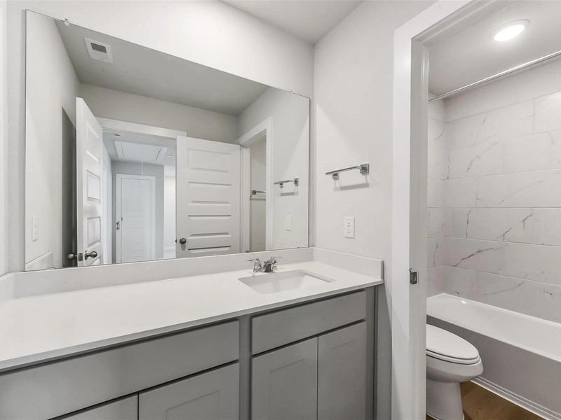 Furnished interior view inside a new home in Windmill Estates, Magnolia (Image 35).