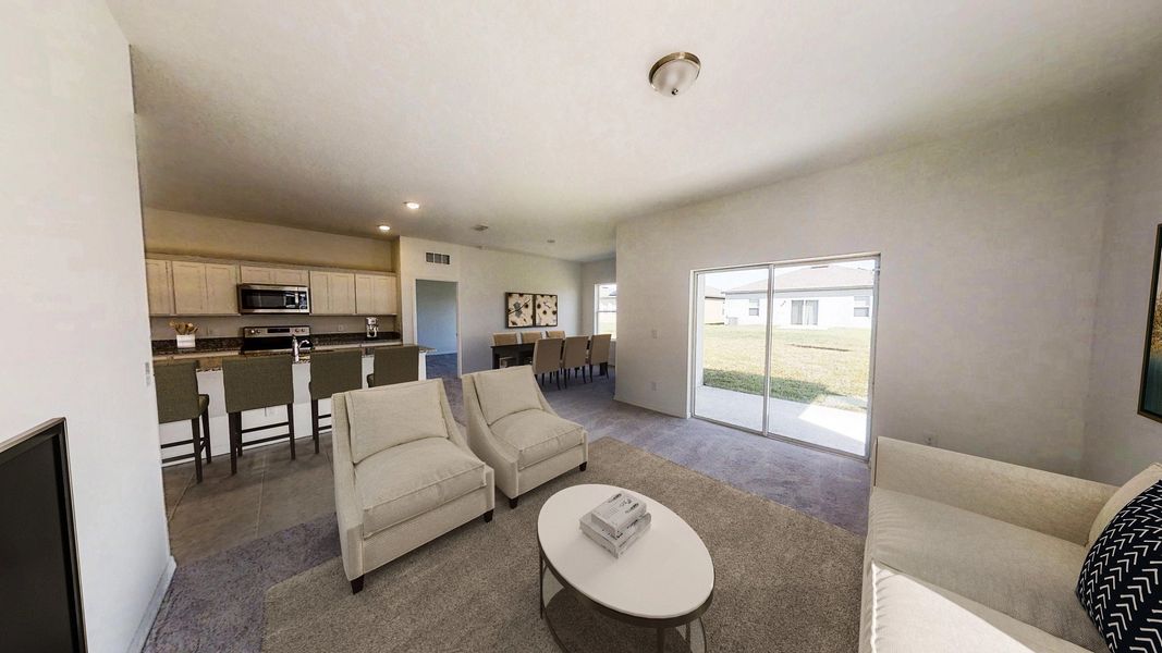 Representative furnished interior of a home built from the Luna by Starlight Homes in Sunset Hills, Winter Haven (Image 4).