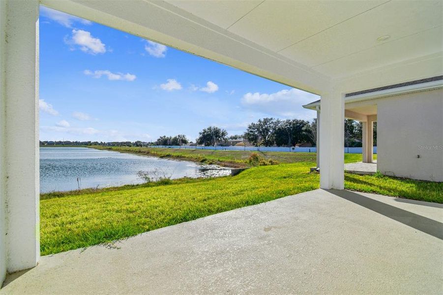 Exterior details and patio area of a home in The Peninsula at Rhodine Lake, Riverview (Image 27).