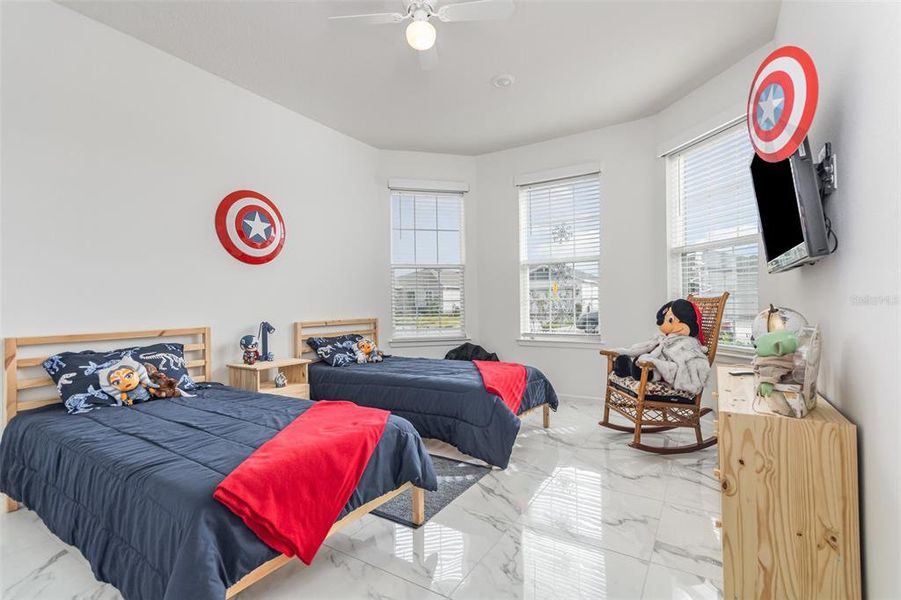 Furnished interior view inside a new home in Tohoqua Reserve, Kissimmee (Image 6).