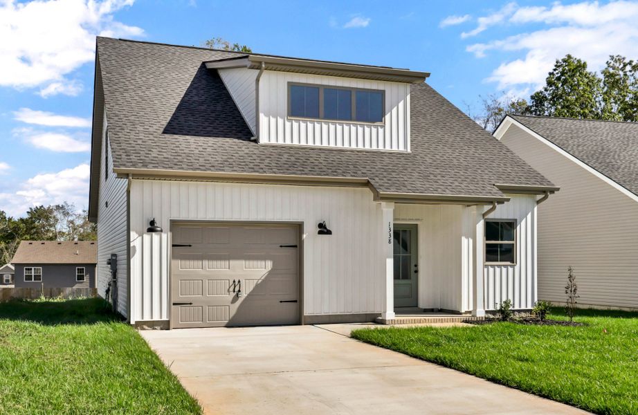 Front exterior of a new home in Fletchers Bend, Clarksville, TN, highlighting curb appeal (Image 1). Front exterior of a new home in Fletchers Bend, Clarksville, TN, highlighting curb appeal (Image 1).