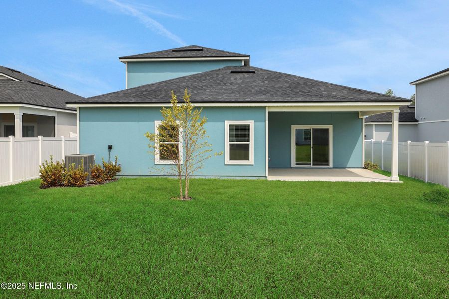 Front exterior of a new home in Cordova Palms, St. Augustine, FL, highlighting curb appeal (Image 18).