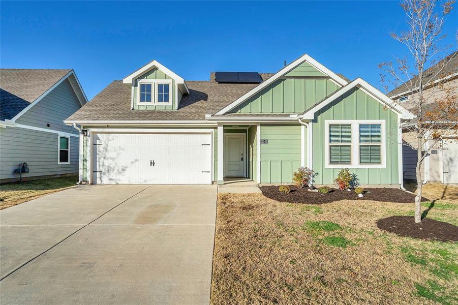 Front exterior of a new home in Enclave at Pecan Creek, Krugerville, TX, highlighting curb appeal (Image 1). Front exterior of a new home in Enclave at Pecan Creek, Krugerville, TX, highlighting curb appeal (Image 1).
