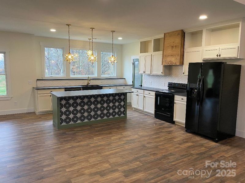 Kitchen, open concept as viewed from the front door