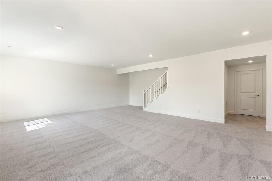 Spacious, unfurnished interior of a new home in Terrain Oak Valley, Castle Rock (Image 21).