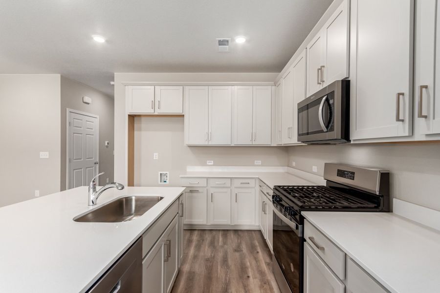 Furnished interior view inside a new home in Painted Prairie, Aurora (Image 7).