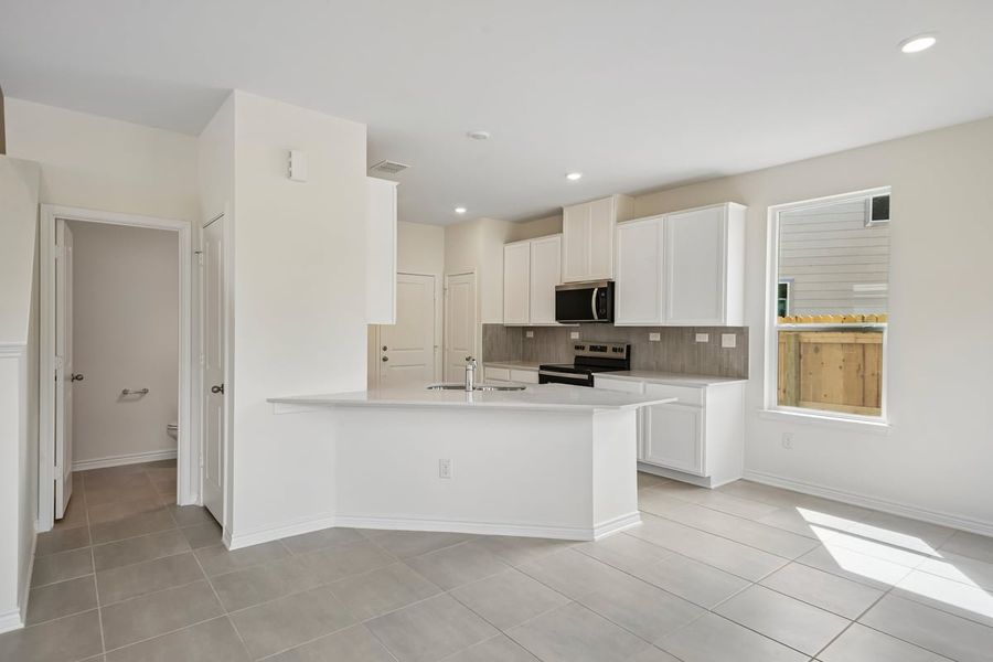 Furnished interior view inside a new home in Nagel Crossing, San Antonio (Image 6).
