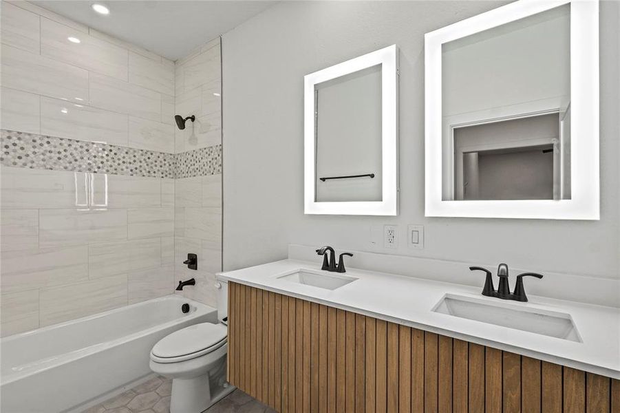 Bathroom with vanity and independent shower and bath