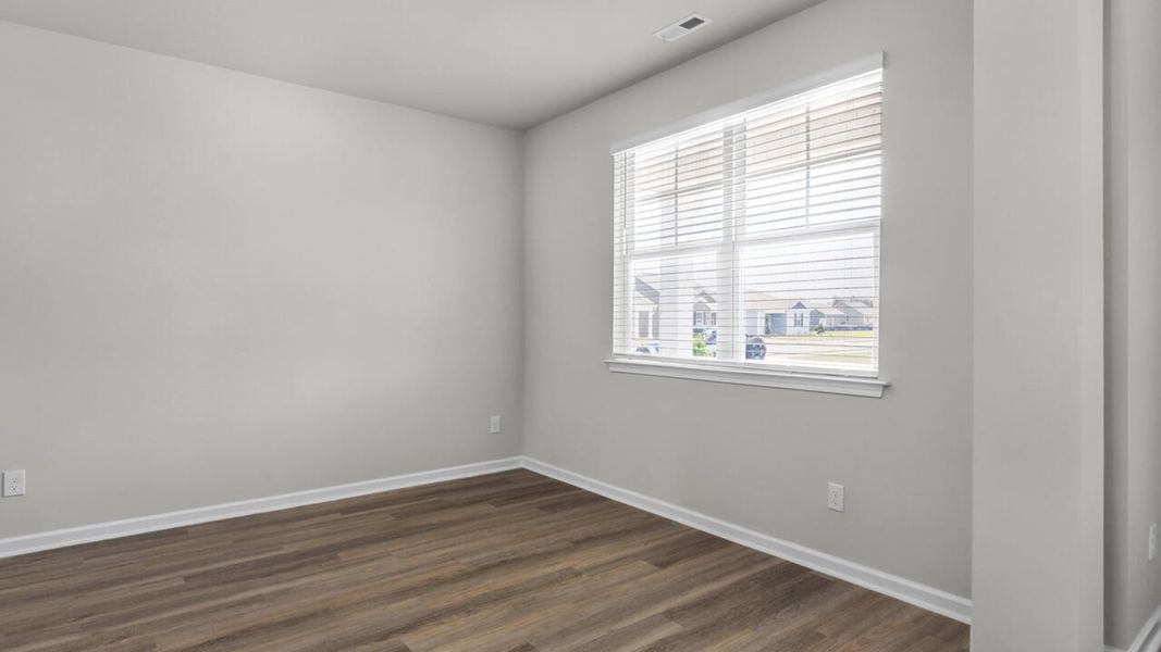 Spacious, unfurnished interior of a new home in Surfside Landing, Hubert (Image 15).