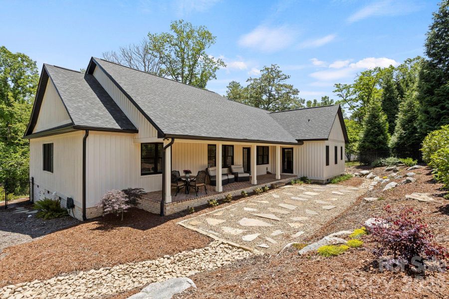 Exterior details and patio area of a home in , Hendersonville (Image 25).
