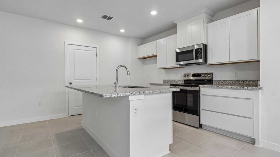 Furnished interior view inside a new home in Cyrene at Harmony, St. Cloud (Image 13).