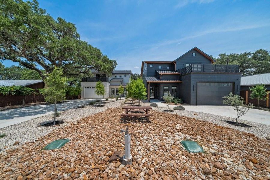 Set on a private one-acre homesite, this remarkable family compound offers two architecturally designed residences, generous parking, modern curb appeal, and an ideal layout for multigenerational living, guests, or investment opportunities. Set on a private one-acre homesite, this remarkable family compound offers two architecturally designed residences, generous parking, modern curb appeal, and an ideal layout for multigenerational living, guests, or investment opportunities.