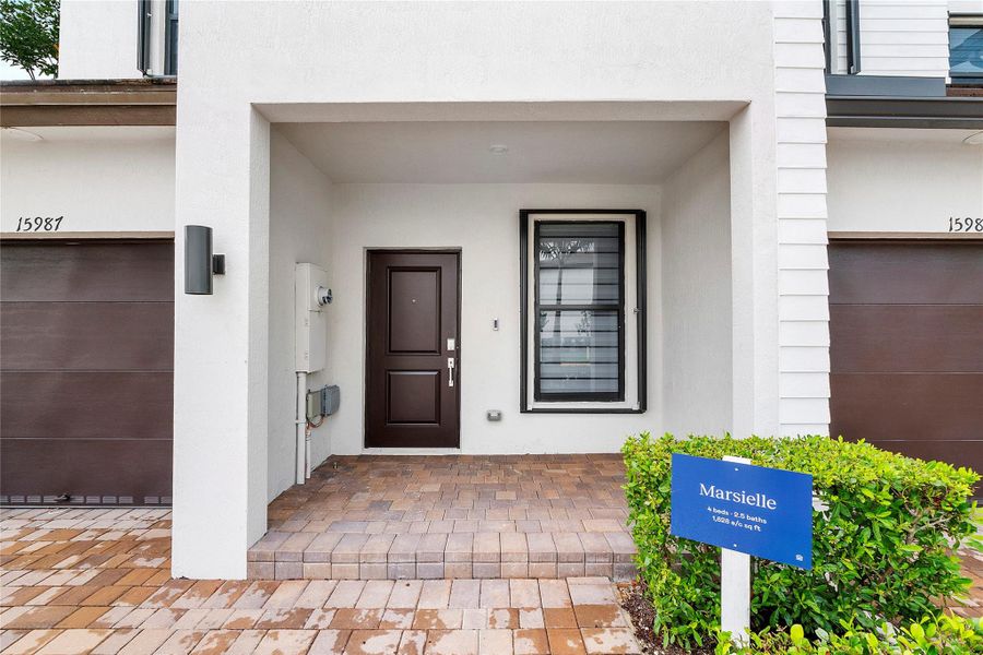 Front exterior of a new home in , Pembroke Pines, FL, highlighting curb appeal (Image 23).
