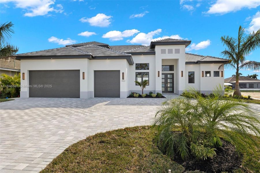 Front exterior of a new home in , Cape Coral, FL, highlighting curb appeal (Image 2).
