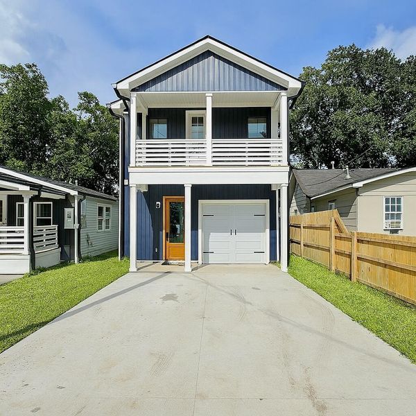 Front exterior of a new home in , North Charleston, SC, highlighting curb appeal (Image 2).