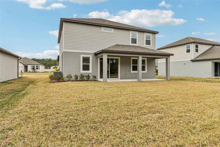 Exterior details and patio area of a home in Legends Preserve - Signature Series, Daytona Beach (Image 4).