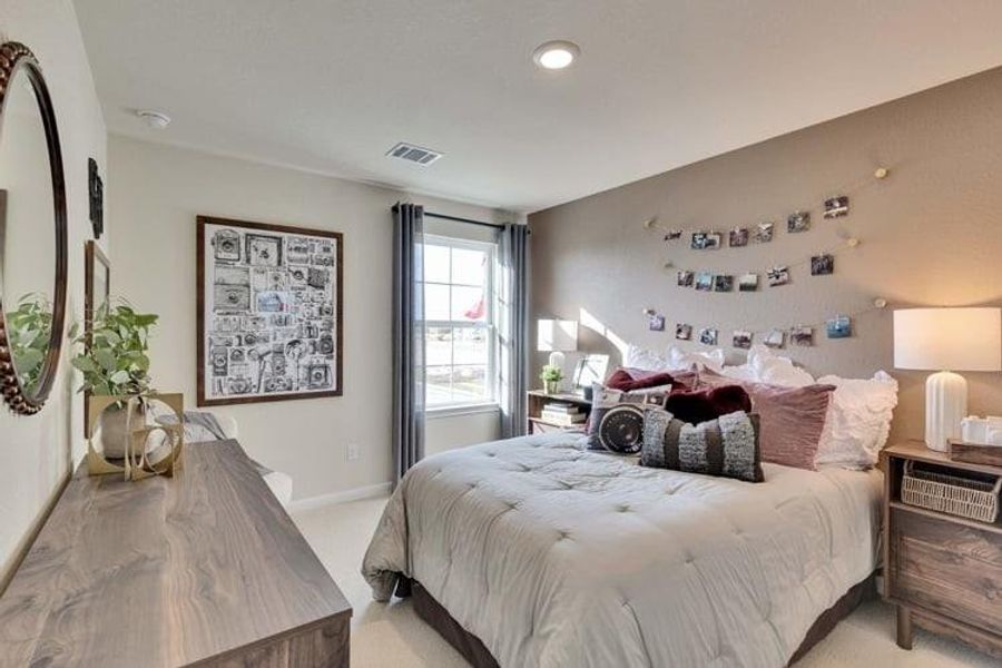 Furnished interior view inside a new home in The Highlands at Avery Centre, Round Rock (Image 11). Furnished interior view inside a new home in The Highlands at Avery Centre, Round Rock (Image 11).