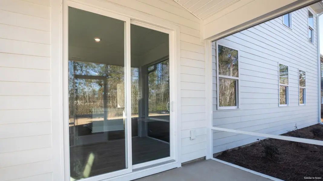 Exterior details and patio area of a home in The Haven at Indigo Preserve, Leland (Image 3).